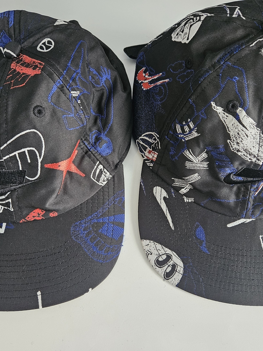 Nike Kids Black Hat with Blue, White & Red Graphic Print